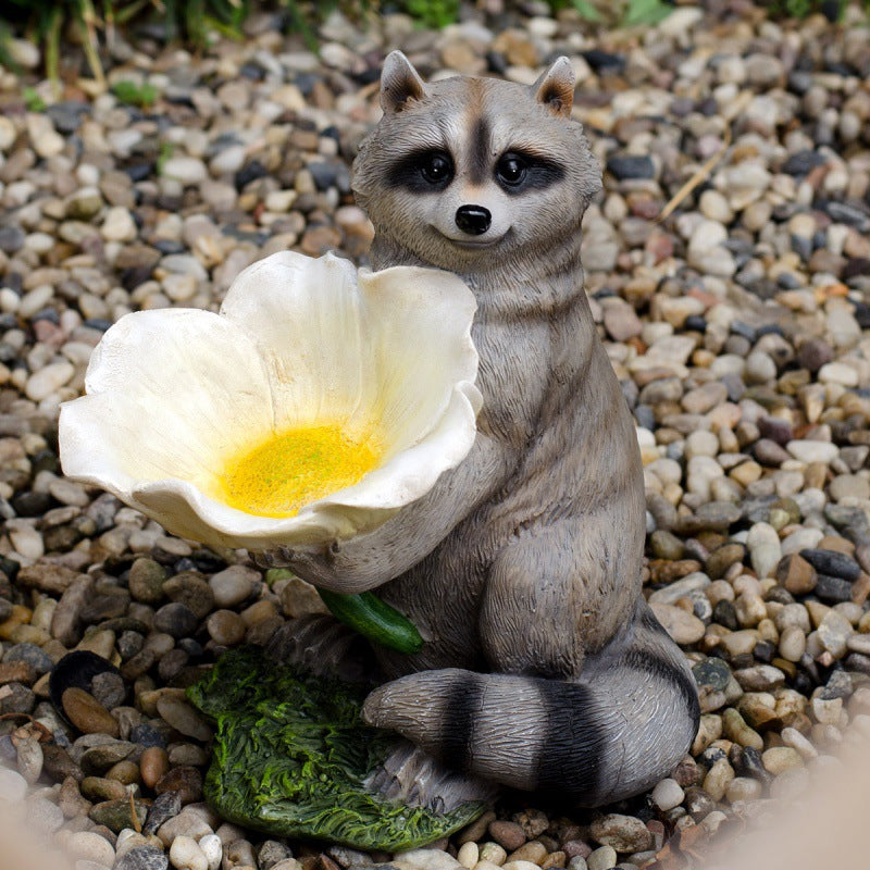Garden decoration raccoon birdfeeder