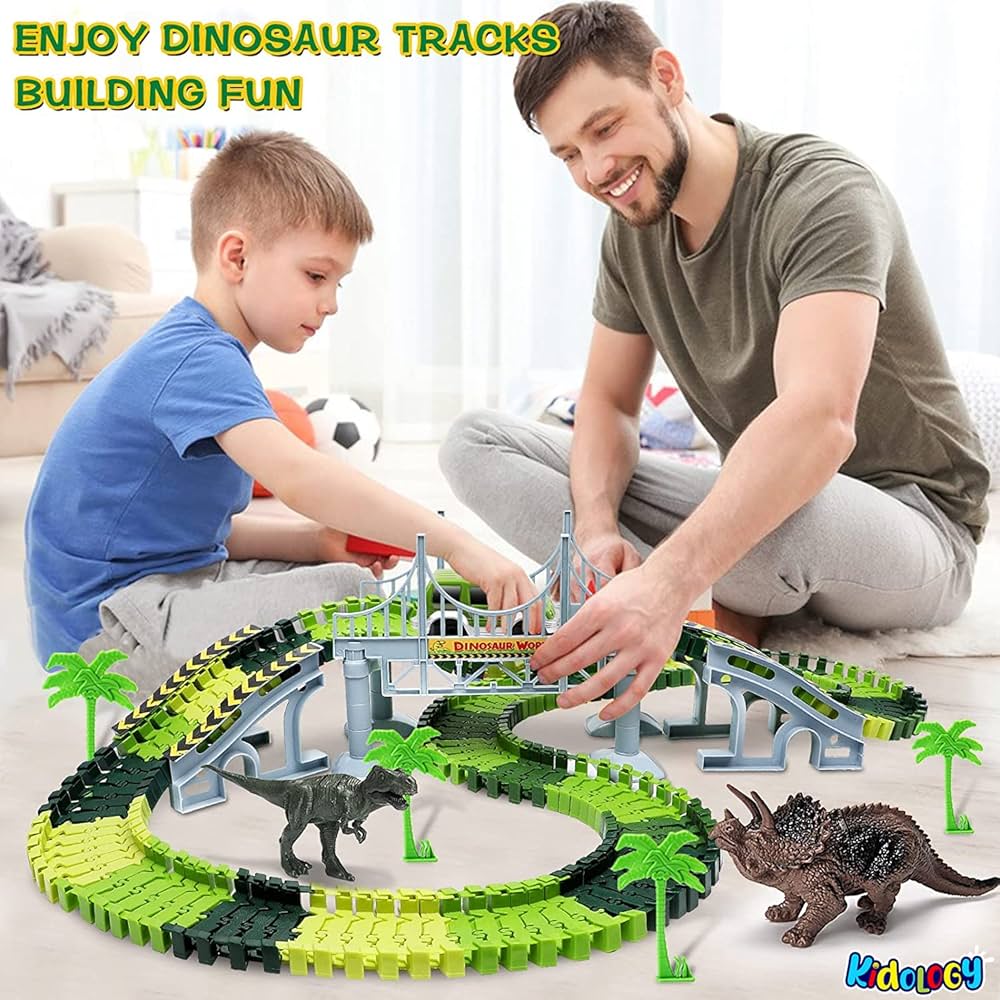 Electric toy car with tracks