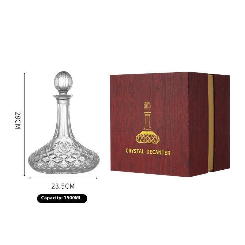 Crystal whiskey decanter in wooden gift box