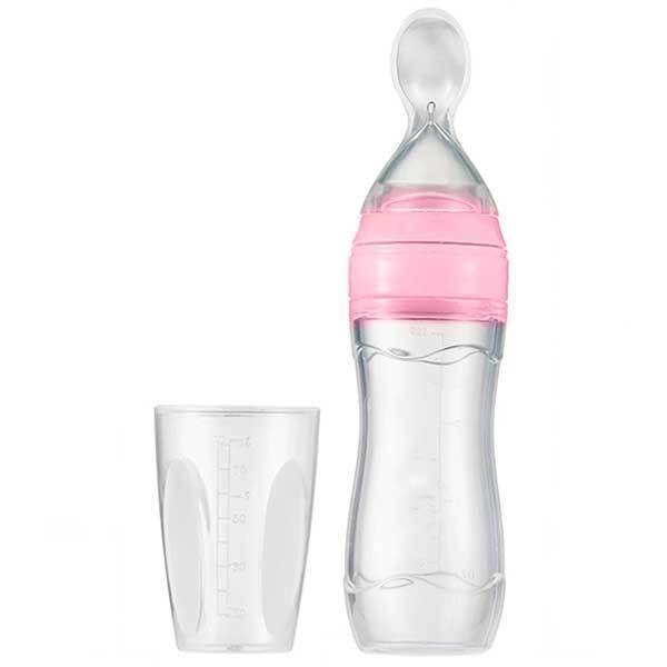 Baby bottle with spoon