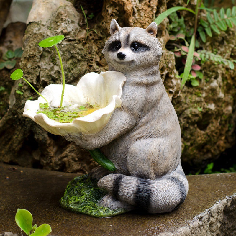 Garden decoration raccoon birdfeeder