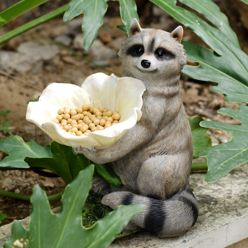 Garden decoration raccoon birdfeeder