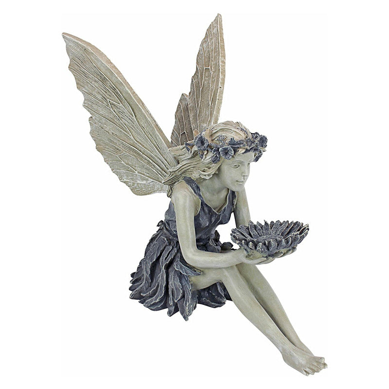 Garden statue sitting angel fairy