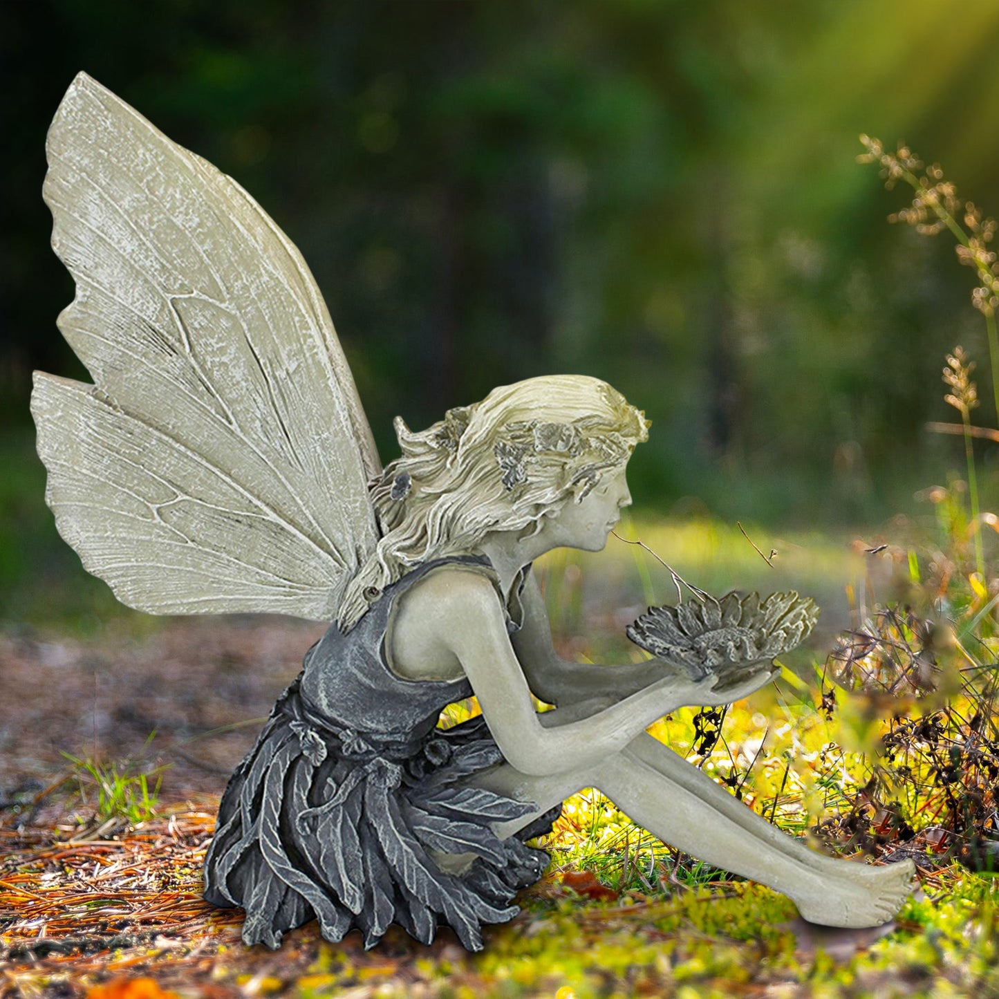 Garden statue sitting angel fairy