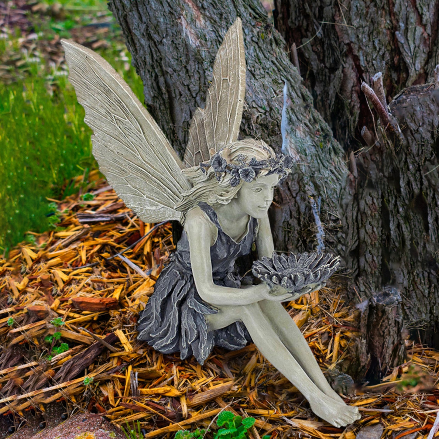 Garden statue sitting angel fairy