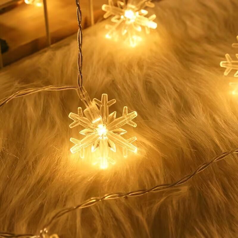 String lights star and snowflake