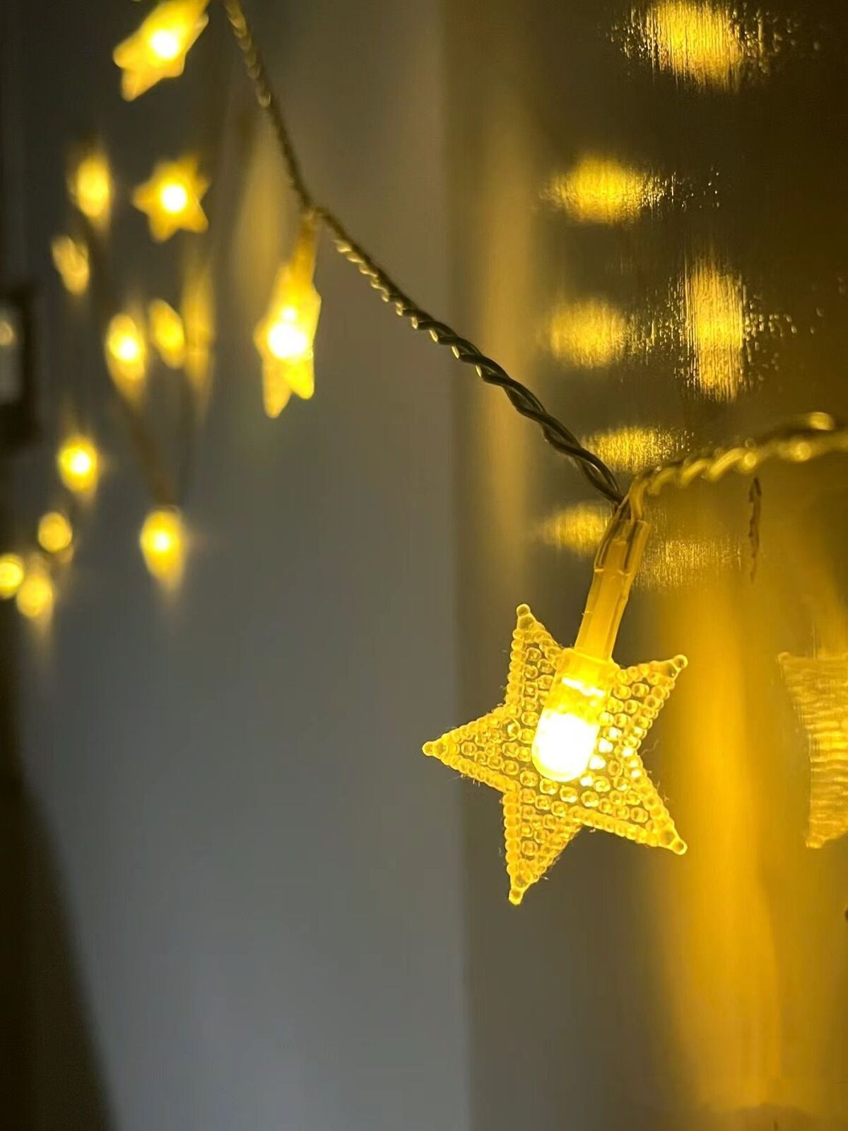 String lights star and snowflake