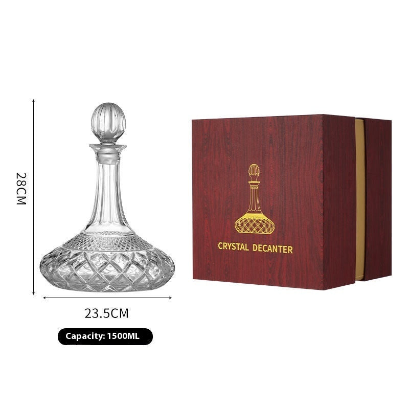 Crystal whiskey decanter in wooden gift box