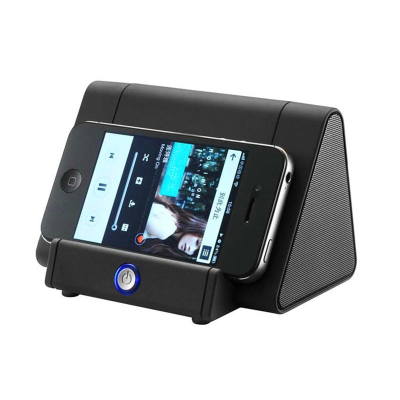 Phone stand with wireless speaker