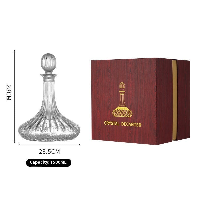 Crystal whiskey decanter in wooden gift box