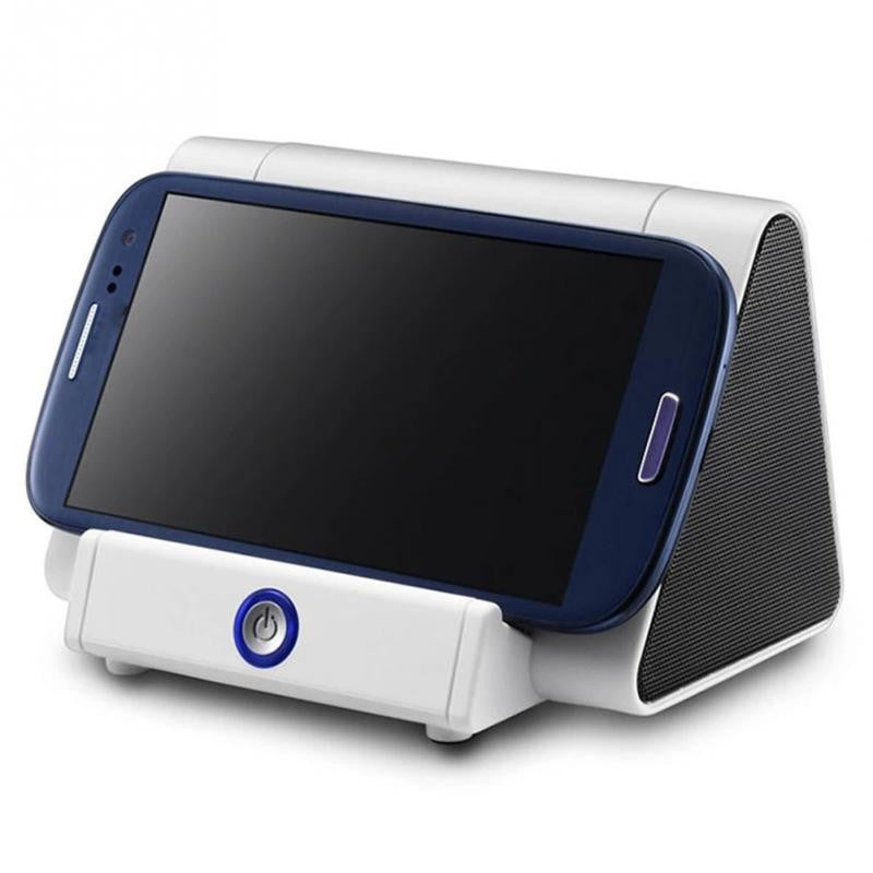 Phone stand with wireless speaker