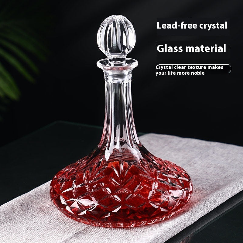 Crystal whiskey decanter in wooden gift box
