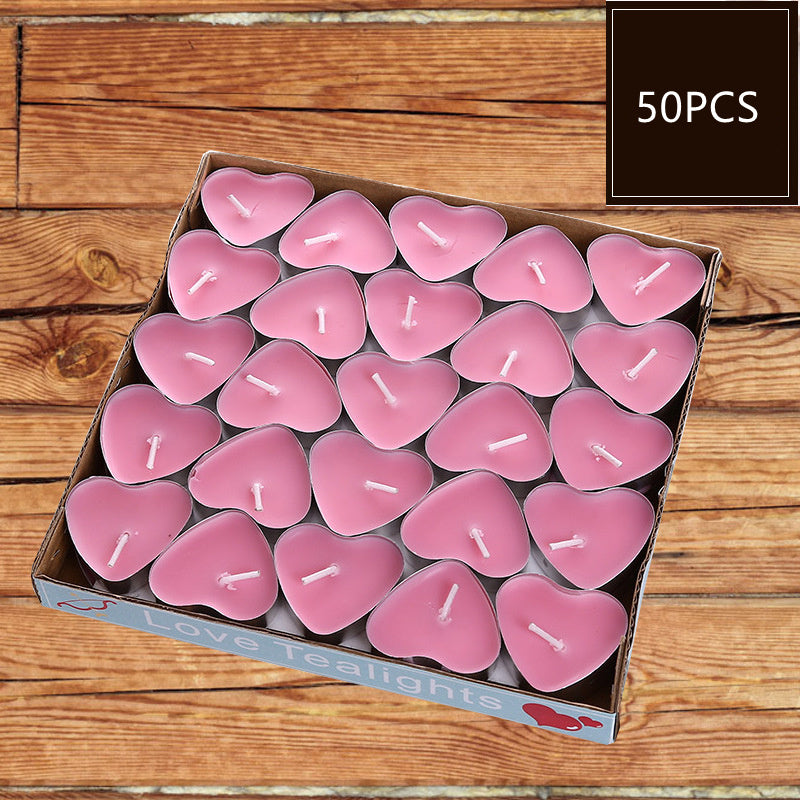 Colorful candles heart shaped