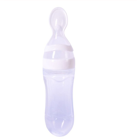 Baby bottle with spoon