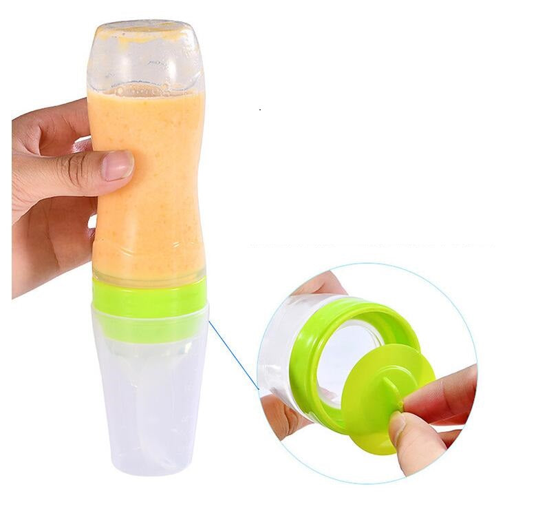 Baby bottle with spoon