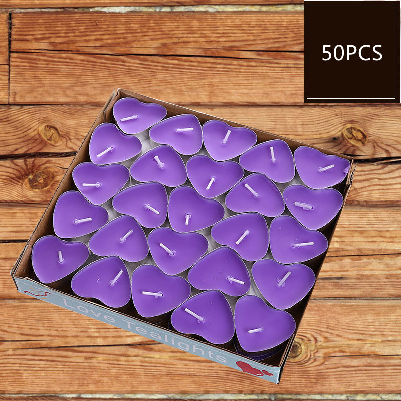 Colorful candles heart shaped