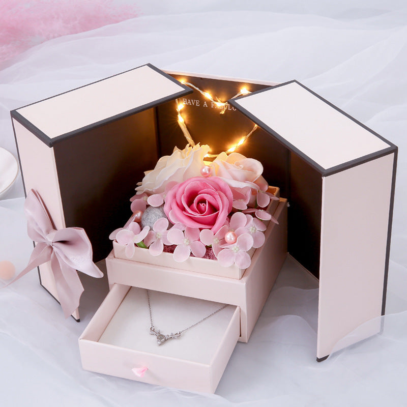 Gift box drawer with flower and leds