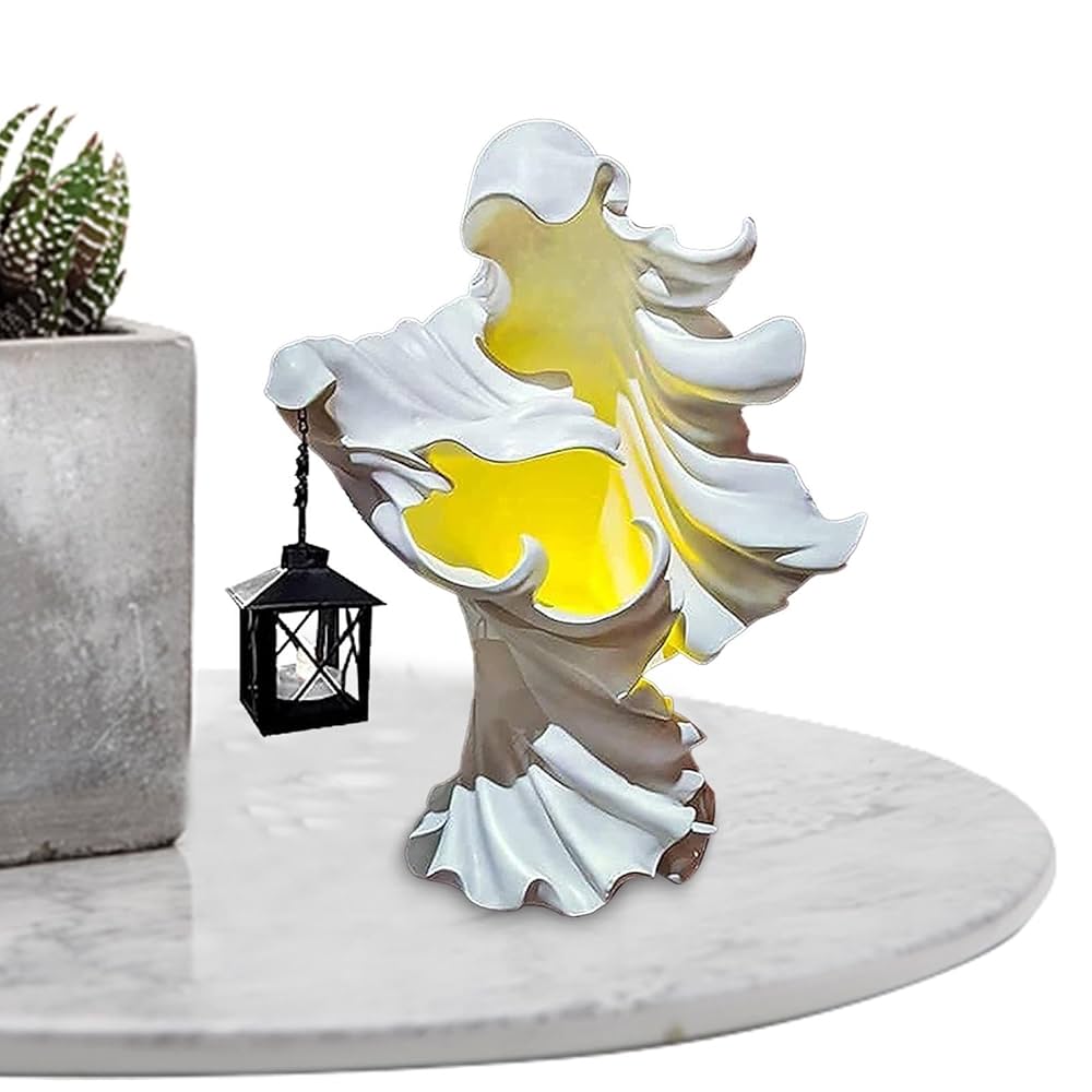 Halloween ghost statue with lantern