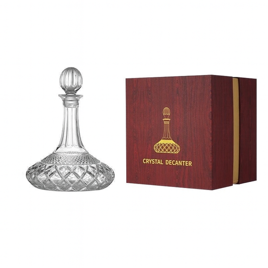 Crystal whiskey decanter in wooden gift box