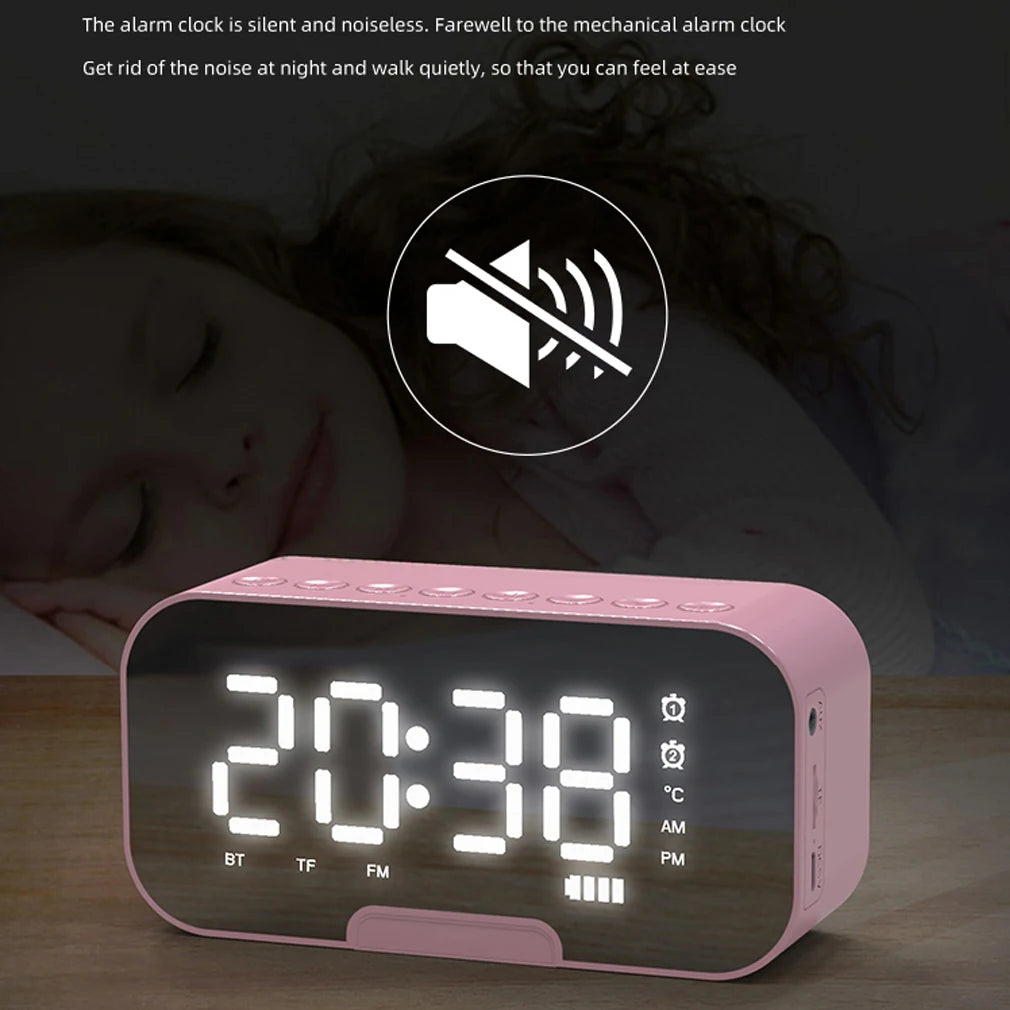 Alarm clock with mirror