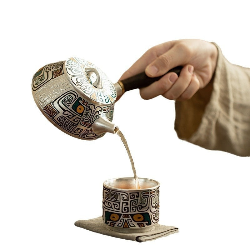 Silver plated tea set in leather case