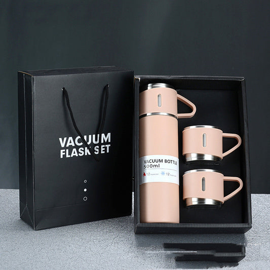 Vacuum flask set with bottle and mugs